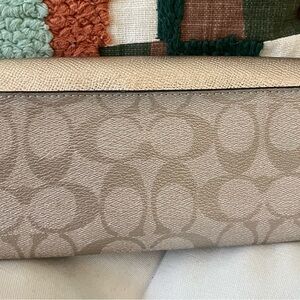 leather platinum symbol coach Wallet